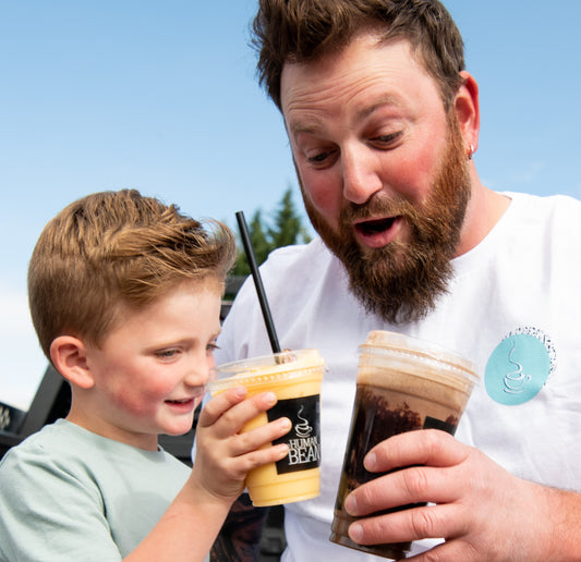 Dad with son at The Human Bean enjoying a drink together