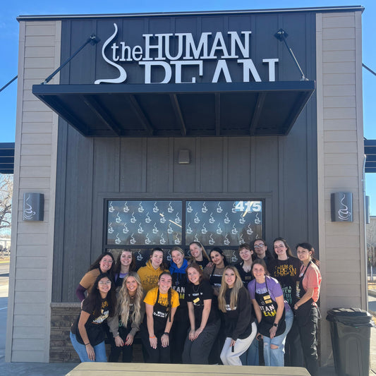 Baristas at The Human Bean of West Laramie pose in front of the new location, which opened on Tuesday, February 10th.