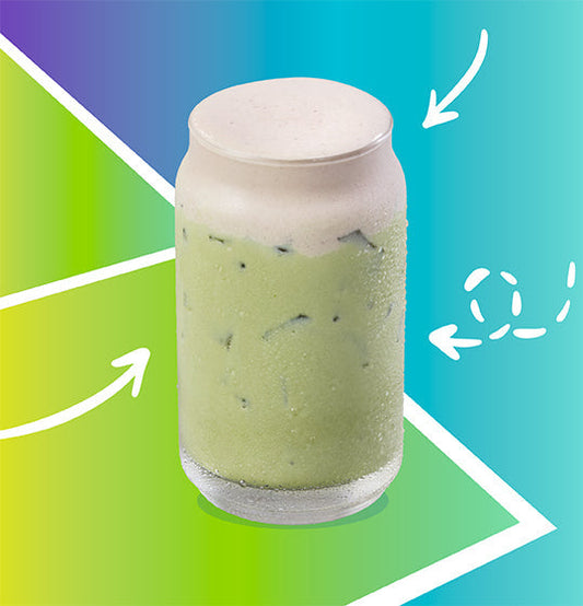 Matcha Berry drink, a blend of earthy green matcha and sweet blueberry in a clear cup with whipped cream on top.