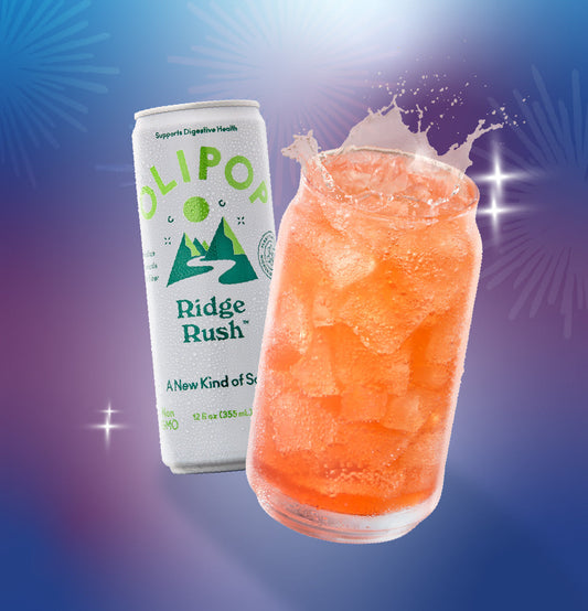All American Cherry Citrus Soda featuring Olipop in a glass cup
