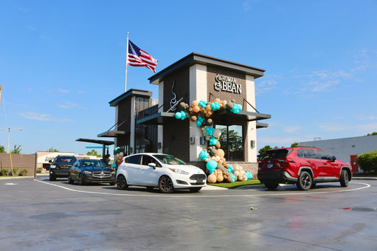 Guests line the drive-thru on opening day at a new The Human Bean location in Murfreesboro, Tennessee, welcoming the brand to the community.