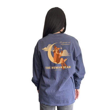 Person wearing a blue long-sleeve shirt with 'The Human Bean' logo on the back.