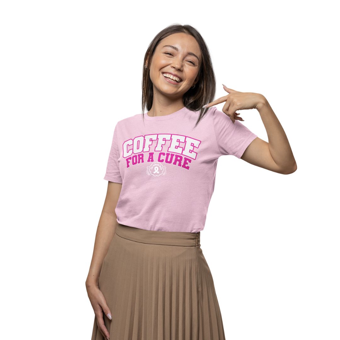 Woman wearing a pink t-shirt with 'Coffee for a Cure' text on a white background