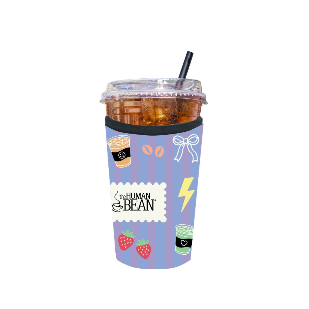 Tumbler with a sleeve featuring illustrations and 'The Human Bean' branding on a white background