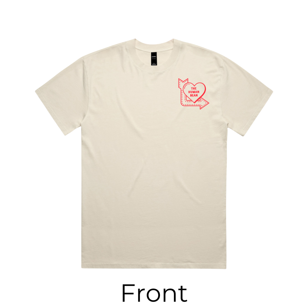 Beige t-shirt with a red graphic on the chest against a white background