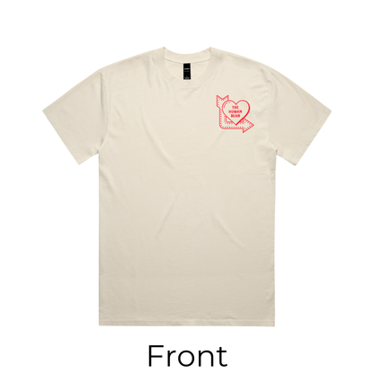 Beige t-shirt with a red graphic on the chest against a white background