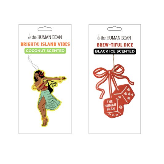 Two packages of 'The Human Bean' scented products on a white background.