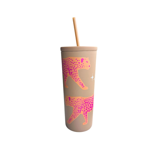 Tumbler with a pink and orange cheetah design on a beige background