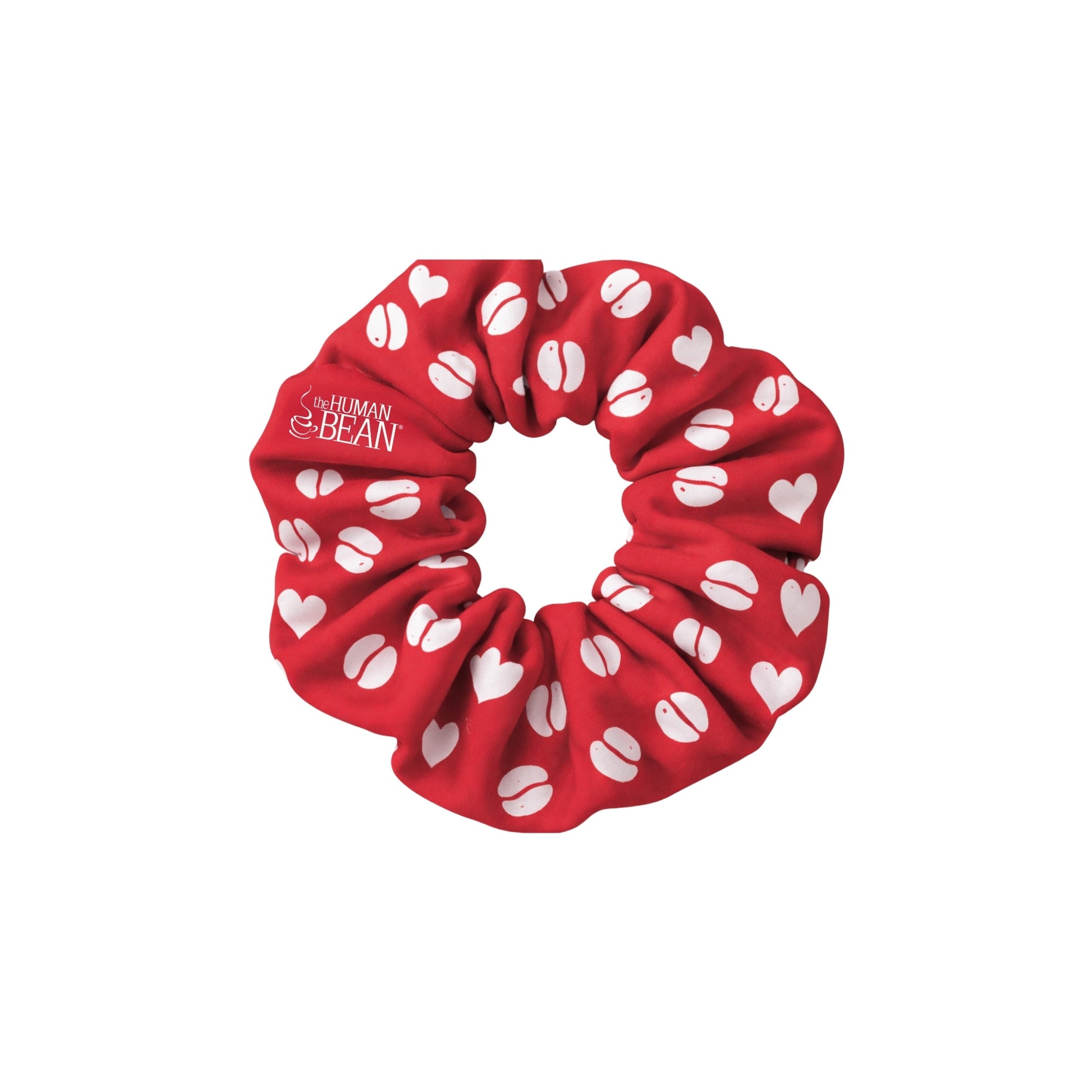 Red scrunchie with white heart and coffee bean patterns on a white background